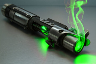 Green laser gun light barrel - a green light free wallpaper