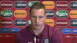 Man purple shirt soccer ball - front of a wall free wallpaper for desktop