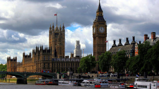 Clock tower city river bridge 2 - a large clock tower free wallpaper