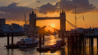 Bridge boat sunset clouds water - the sky and a boat free wallpaper