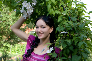 Woman posing tree flowers purple - a purple shirt free wallpaper