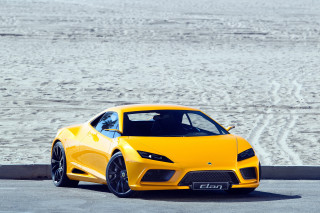 Yellow sports car beach road 2 - a yellow sports car free wallpaper