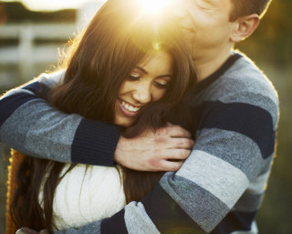 Man woman hugging field grass 3 - a field of grass and trees free wallpaper