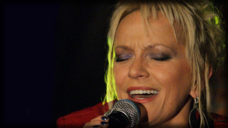 Woman microphone green light hair - her face and hair free wallpaper