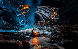 Stream cave rocks lava night - a cave free wallpaper