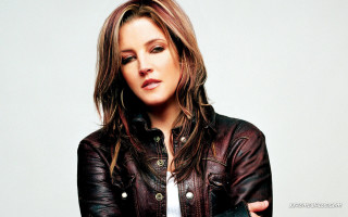 Woman leather jacket posing arms - a leather jacket free wallpaper