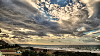 Cloudy sky beach house ocean - constantine andreou free wallpaper for desktop
