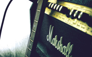 Guitar amplifier closeup light black - post grunge free wallpaper
