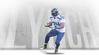 Football player running ball helmet 13 - the wall behind free wallpaper
