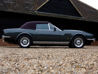 Grey sports car parked building - colin hayes free wallpaper