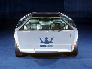 White car blue arrow hood - 1 9 7 0 s free wallpaper