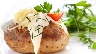 Baked potato cheese vegetables salad - a white plate free wallpaper