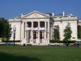 Large building columns flags front - wpa free wallpaper