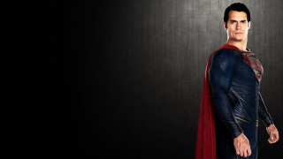 Man superman costume black background 3 - heroic pose free wallpaper