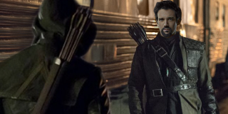 Man green outfit man black - a bow and arrow free wallpaper