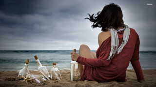 Woman beach wine bottles sand - surreal free wallpaper