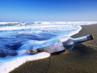 Message bottle beach ocean waves - surreal free wallpaper