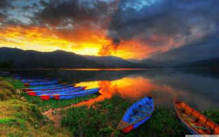 Boats lake cloudy sky sunset - a group of boats free wallpaper