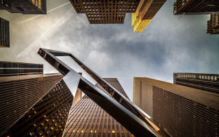 City skyscrapers plane sky view - overhead in the sky free wallpaper