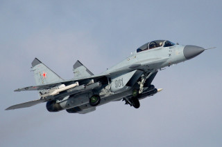 Fighter jet cloudy sky red 8 - a red star free wallpaper