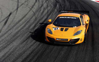 Yellow sports car raceflag checkered - a race track free wallpaper