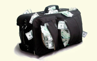 Suitcase money zippered pocket sticking - the side of it free wallpaper