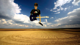 Man skateboard air field grass - free sky wallpaper for desktop