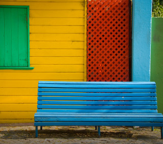 Blue bench yellow building green - a cubist painting free wallpaper for tablet