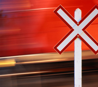 Railroad crossing sign train background - path free wallpaper for tablet