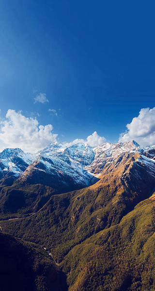 Mountain range snowy peaks blue - free mountains wallpaper for mobile