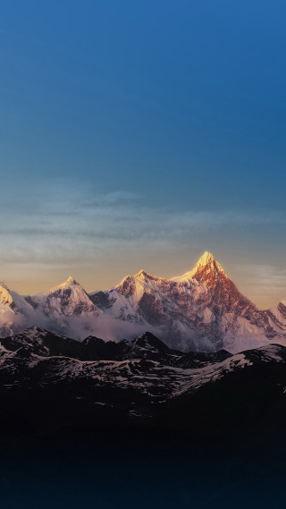 Mountain range snow blue sky 5 - free mountains wallpaper for mobile
