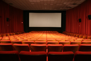 Auditorium seats projector screen red - a large auditorium free wallpaper