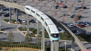 Train bridge parking lot cars - a train free wallpaper