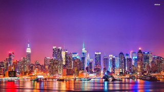 City skyline tall buildings nighttime 11 - the building and the water free wallpaper