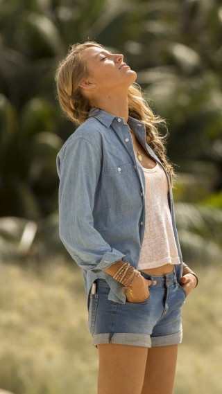 Blonde woman denim shorts sky - a character portrait free wallpaper