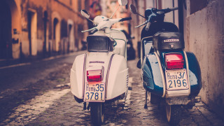 Mopeds parked cobblestone street city - dosso dossi free wallpaper for desktop