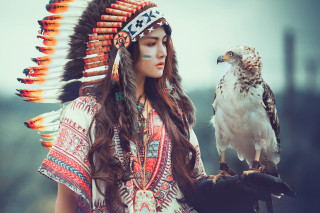 Woman native american headdress falcon - her hand and a bird free wallpaper for desktop