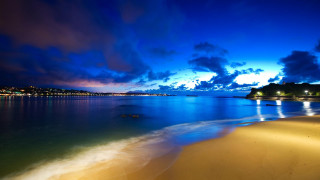 Beach water night clouds lights 2 - beautiful scenery free wallpaper