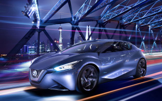Futuristic car night city skyline - a futuristic car free wallpaper