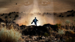 Man hill backpack gun face - top of a hill free wallpaper