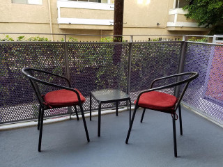Chairs table balcony fence building - mesh wire free wallpaper