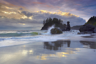Beach rock formation wave shore - a cloudy sky above free wallpaper