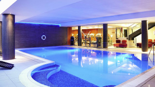 Indoor pool blue light spiral - a spiral staircase free wallpaper