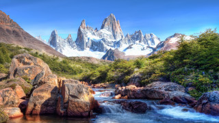 Mountain range river snowy mountains - a mountain range in the background free wallpaper