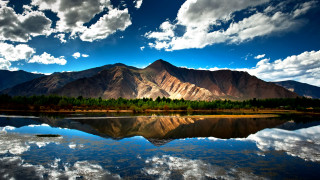 Mountain range lake clouds sky 4 - a lake in the foreground free wallpaper