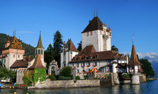 Castle clock tower water bridge - a clock tower free wallpaper