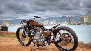 Motorcycle dirtroad water city cloudy - a cloudy day free wallpaper