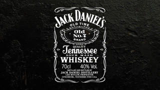 Whiskey label black wall white - a black wall free wallpaper