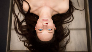 Blue eyes woman laying floor - brooke shaden free wallpaper