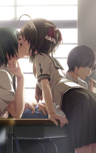 Couple sitting table laptop kissing 2 - a laptop computer free wallpaper